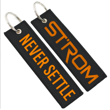 Strom Never Settle Key Tag